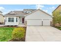 Charming home featuring a manicured lawn, two car garage, and a beautiful bay window for ample natural light at 735 Chesapeake Ave, Monument, CO 80132