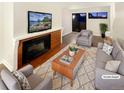 Virtually staged living room featuring a fireplace and comfortable seating at 17054 E Tennessee Dr # 212, Aurora, CO 80017