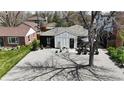 Wide angle shot of a charming home with a well manicured gravel yard and quaint decor throughout at 640 N Magnolia St, Denver, CO 80220