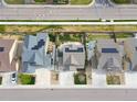Aerial view of neighborhood showcasing roof lines, backyard patios, and front yard landscaping at 5362 E 140Th Pl, Thornton, CO 80602