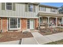 Inviting front exterior with a cozy porch and meticulously kept garden at 2729 E Geddes Pl, Centennial, CO 80122