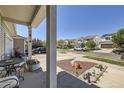 Inviting street view featuring a well-maintained two-story home with a charming front yard at 20530 Randolph Pl, Denver, CO 80249