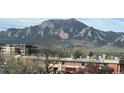 Scenic mountain view overlooking nearby buildings at 501 Manhattan Dr # 202, Boulder, CO 80303