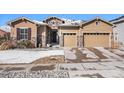 Charming home featuring stone accents, a two-car garage, and well-maintained landscaping at 11541 Quartzite Way, Parker, CO 80138