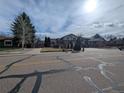 Charming two-story home with a well-manicured front lawn and a two-car garage on a tree-lined street at 2325 15Th Ave, Longmont, CO 80503