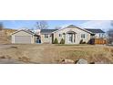 Inviting single-Gathering home with a detached garage and mature landscaping at 3230 S Decatur St, Denver, CO 80236