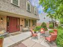Inviting front porch with comfortable seating, perfect for relaxing outdoors at 7030 S Fillmore Ct, Centennial, CO 80122