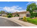 Well-maintained single Gathering home features a manicured lawn and an attached garage at 3780 E 117Th Ave, Thornton, CO 80233