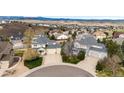 An elevated view showcasing the home's location in a peaceful neighborhood with mountain views at 4157 Astrion Ct, Castle Rock, CO 80104