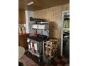 Classic kitchen with vintage stove, wood accents, and cozy, rustic charm at 10504 Jackson Creek Rd, Sedalia, CO 80135