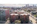 A charming building with a red brick exterior in a bustling city at 1475 N Humboldt St # 22, Denver, CO 80218