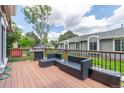 Spacious back deck featuring outdoor furniture and a grill, perfect for outdoor entertaining at 7925 York St # 2, Denver, CO 80229