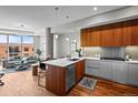 Modern kitchen with stainless steel appliances, wooden accents, and an open layout at 4200 W 17Th Ave # 621, Denver, CO 80204