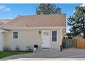 Charming home exterior featuring a well-maintained yard and classic architectural details at 4762 S Clay Ct, Englewood, CO 80110