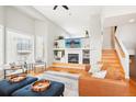 Cozy living area with a fireplace, TV, and comfortable seating, great for relaxing at 5058 E Cherry Creek South Dr, Denver, CO 80246