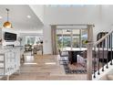 Bright dining area with hardwood floors, and sliding doors to backyard, ideal for entertaining at 9140 Moondance Dr, Littleton, CO 80125