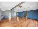 Spacious living room with vaulted ceilings, fireplace, and ample natural light at 12008 E Amherst Pl, Aurora, CO 80014