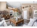 Inviting foyer showcases a staircase, hardwood floors, and designer touches at 13087 Krameria St, Thornton, CO 80602