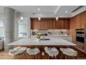 Modern kitchen island with stylish seating and contemporary finishes at 4200 W 17Th Ave # 625, Denver, CO 80204
