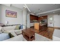 Open living space with modern decor, stylish furniture, and hardwood flooring at 4200 W 17Th Ave # 625, Denver, CO 80204