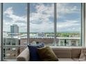 Stunning city view from the living room, showcasing urban and natural landscapes at 4200 W 17Th Ave # 625, Denver, CO 80204