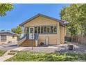 Charming home with inviting staircase and gravel landscaping at 3280 Fenton St, Wheat Ridge, CO 80212