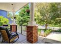 Inviting front porch with a cozy seating area, perfect for enjoying the outdoors and curb appeal at 16084 Stonebriar Dr, Parker, CO 80134