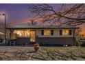 Cozy one-story home featuring a brick facade, well-kept lawn, and large front yard perfect for outdoor enjoyment at 8244 Clemson Ln, Westminster, CO 80031