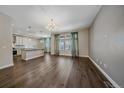 Spacious living area with hardwood floors and natural light at 12255 Hazel Spruce Ct, Parker, CO 80134