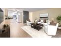 Bright open floorplan featuring updated kitchen, modern furniture, and a cozy living space at 3124 S Wheeling Way # 102, Aurora, CO 80014