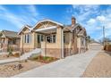 Beautiful brick home with a well-manicured yard and a detached garage at 1578 N Meade N St, Denver, CO 80204