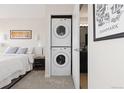 Convenient stacked washer and dryer in the unit, located near the bedroom at 100 Park W Ave # 1403, Denver, CO 80205