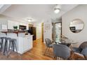 Open kitchen with modern appliances, ample counter space, and a breakfast bar, perfect for casual dining at 840 S Vance St # A, Lakewood, CO 80226