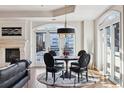 Elegant dining area with city views and hardwood floors at 1827 N Grant St # 1000, Denver, CO 80203