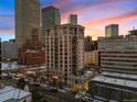 Modern high-rise building in urban setting at dusk at 1827 N Grant St # 1000, Denver, CO 80203