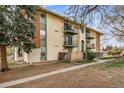 A charming two-story apartment building featuring multiple balconies at 12113 Melody Dr # 304, Denver, CO 80234