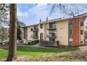 A charming two-story apartment building featuring multiple balconies at 12113 Melody Dr # 304, Denver, CO 80234
