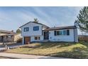 Charming two-story home with a well-maintained lawn and inviting curb appeal at 4328 S Carr Ct, Littleton, CO 80123