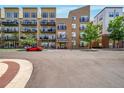 Exterior view of modern condo building with reserved parking at 7240 W Custer Ave # 301, Lakewood, CO 80226