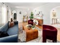 Spacious living room with hardwood floors and contemporary furniture at 720 S Clayton St, Denver, CO 80209