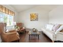 Bright living room with stylish furnishings and ample natural light at 4873 Eckert St, Castle Rock, CO 80104