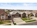 Beautiful single-Gathering home with a manicured front lawn and a two-car garage in a scenic neighborhood at 7797 S Valleyhead Way, Aurora, CO 80016