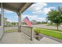 Charming front porch view of a home in a quiet neighborhood at 12854 Clearview St, Firestone, CO 80504