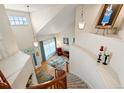 Bright entryway with a staircase, high ceilings, and a view of the living room at 952 Eaglestone Dr, Castle Rock, CO 80104