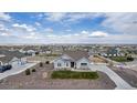 Lovely single-story home with an expansive view of the neighborhood at 16122 Emporia Way, Brighton, CO 80602