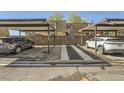 Carport parking spaces with covered parking and easy access to the units at 6492 Simms St # A, Arvada, CO 80004