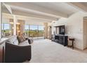 Bright living room with floor-to-ceiling windows and beautiful views at 8060 E Girard Ave # 712, Denver, CO 80231