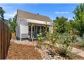 Updated bungalow with a welcoming front porch at 1111 E Dartmouth Ave, Englewood, CO 80113