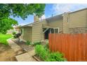 Charming home with inviting front entry and well-maintained landscaping at 3890 S Atchison Way # B, Aurora, CO 80014