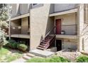 Charming condo exterior featuring a private entrance with steps leading to the front door and a cozy balcony at 5300 E Cherry Creek South Dr # 620, Denver, CO 80246